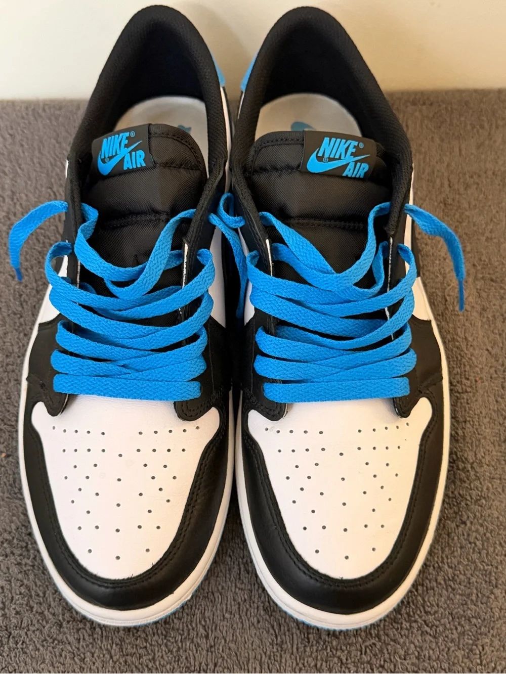 Nike Air Jordan 1 “low” men’s size 10 1/2. Powder blue and Black Dark colorway.